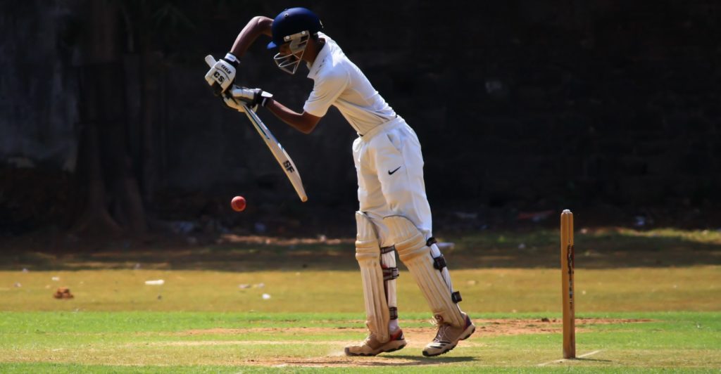 Cricketer playing backwards defensive